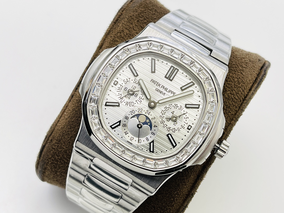 Patek Philippe Nautilus watch with diamond-set bezel and calendar dial on brown cushion