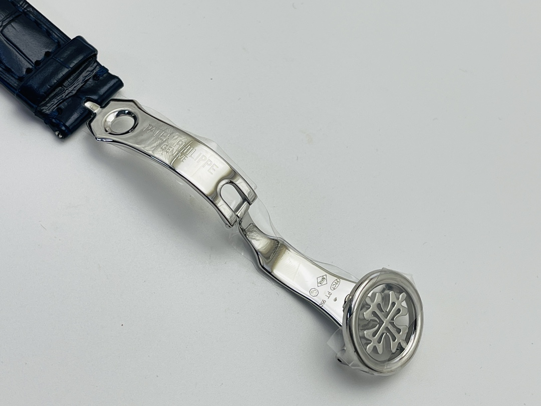 Deployant clasp with engraved branding and hinge mechanism