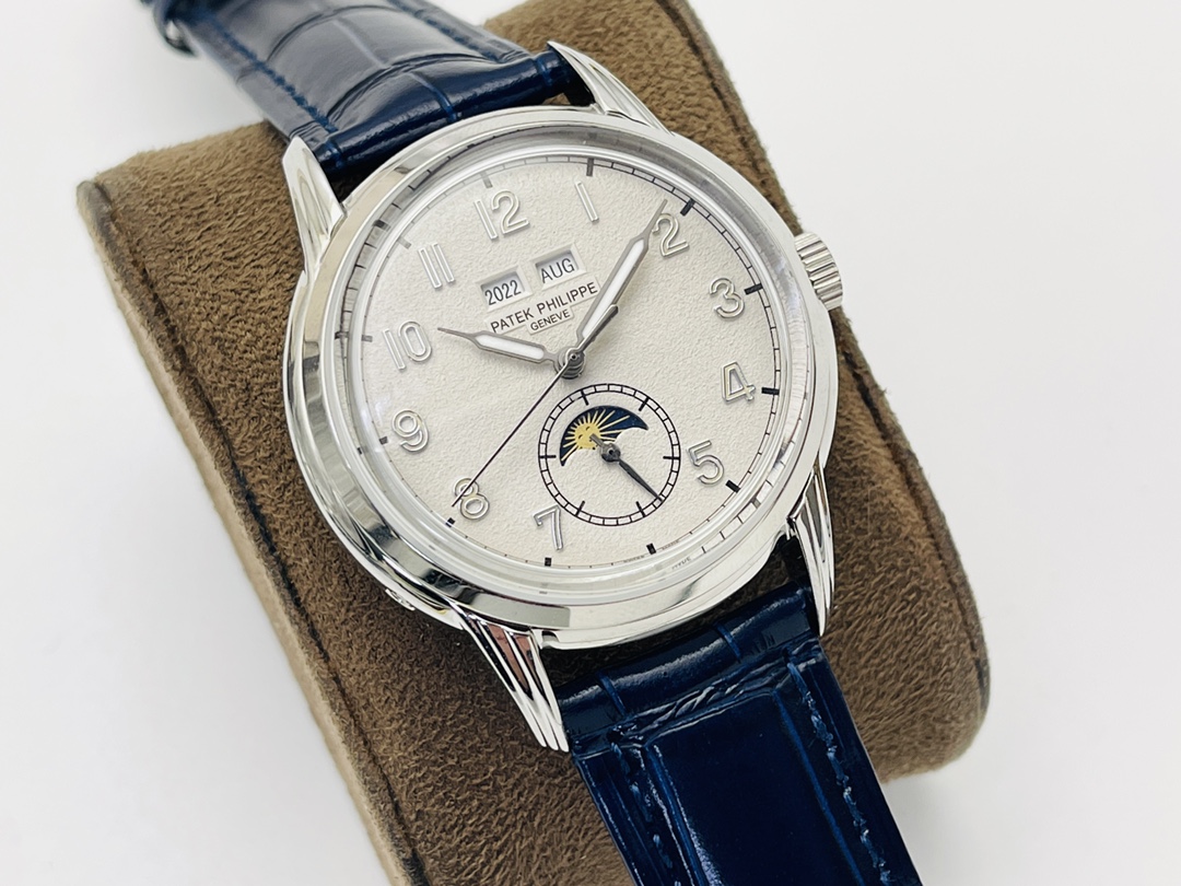 Angled view of elegant Patek Philippe Grand Complications watch with blue strap and moonphase complication