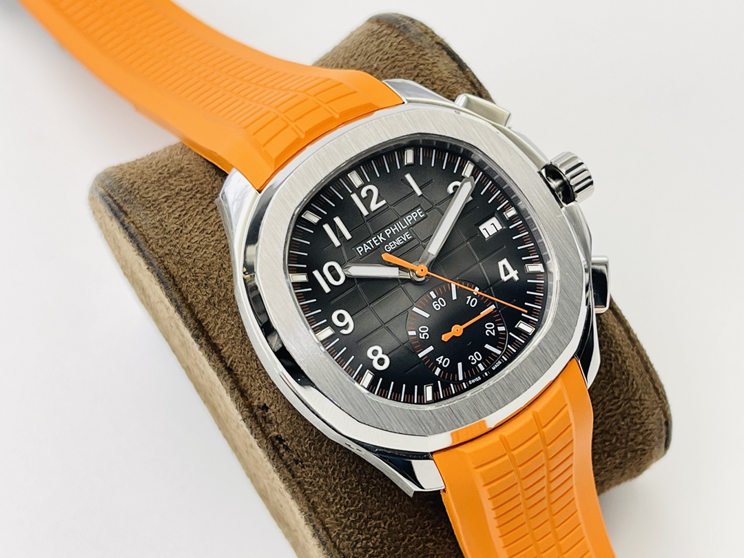 Angled view of the Aquanaut 5968A-001 watch with orange strap on a suede display stand.
