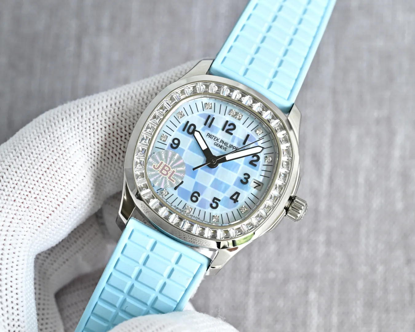 JBL Factory Replica Patek Philippe Aquanaut Luce 5072G-001 Blue Checkered Dial Diamond Bezel Ladies Watch close-up dial on wrist