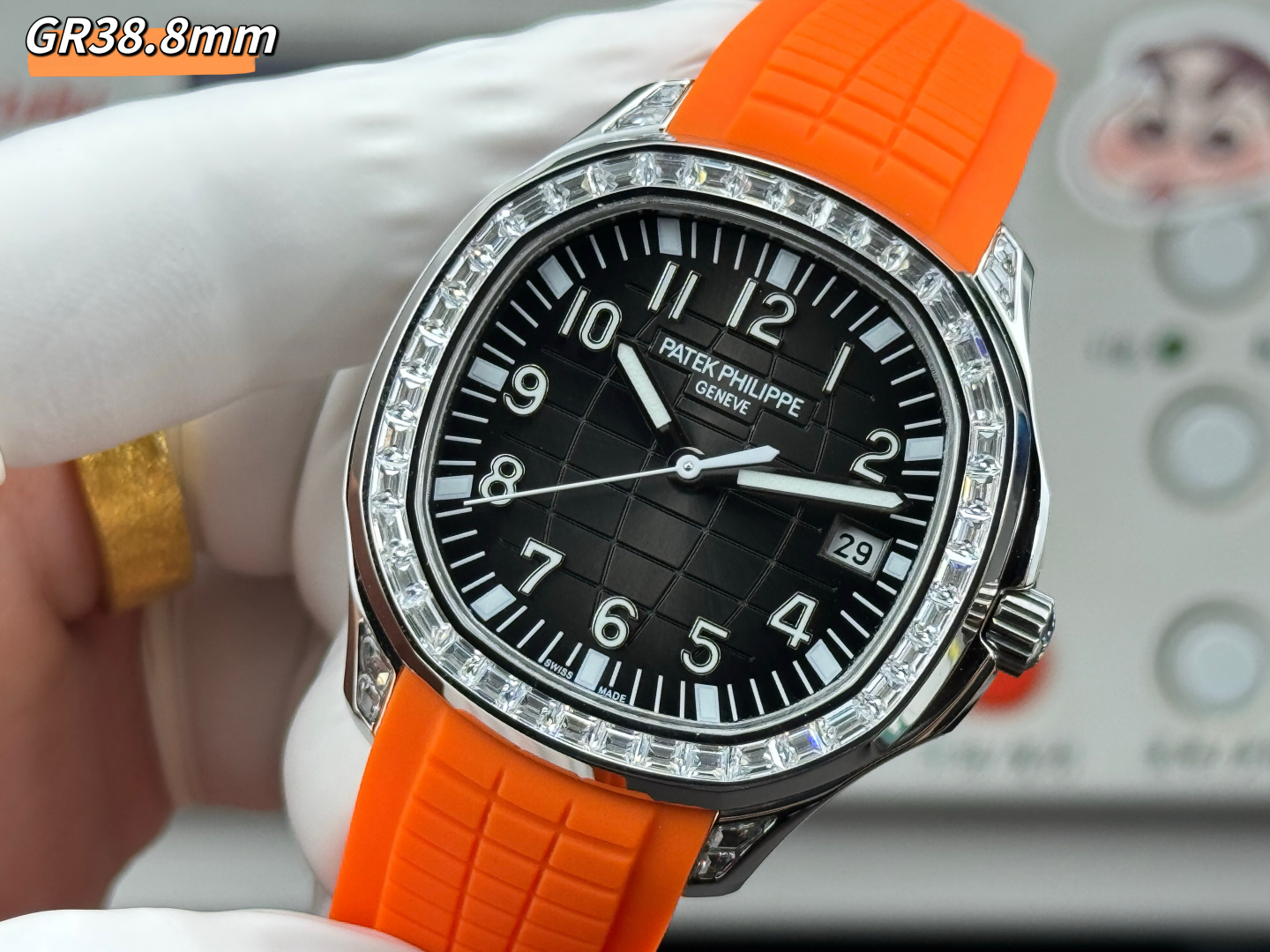 GR Factory Luxury Patek Philippe Aquanaut 5167/300G Replica Black Dial Baguette Diamond Bezel Orange Rubber Strap Watch Dial Detail 2