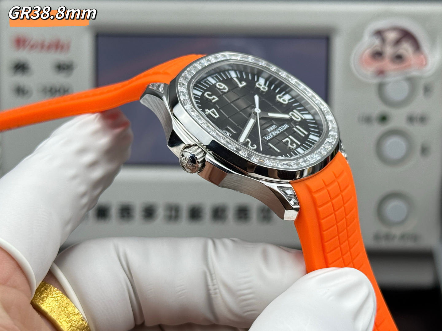 GR Factory Luxury Patek Philippe Aquanaut 5167/300G Replica Black Dial Baguette Diamond Bezel Orange Rubber Strap Watch Side View 2