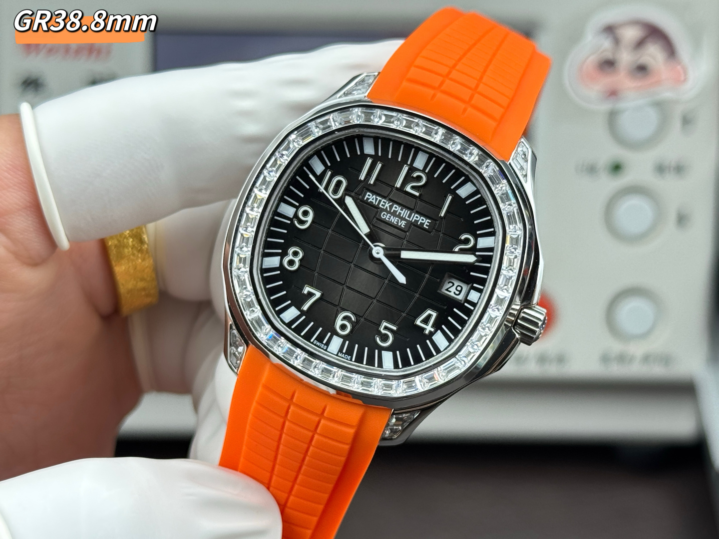 GR Factory Luxury Patek Philippe Aquanaut 5167/300G Replica Black Dial Baguette Diamond Bezel Orange Rubber Strap Watch Dial Side View 1