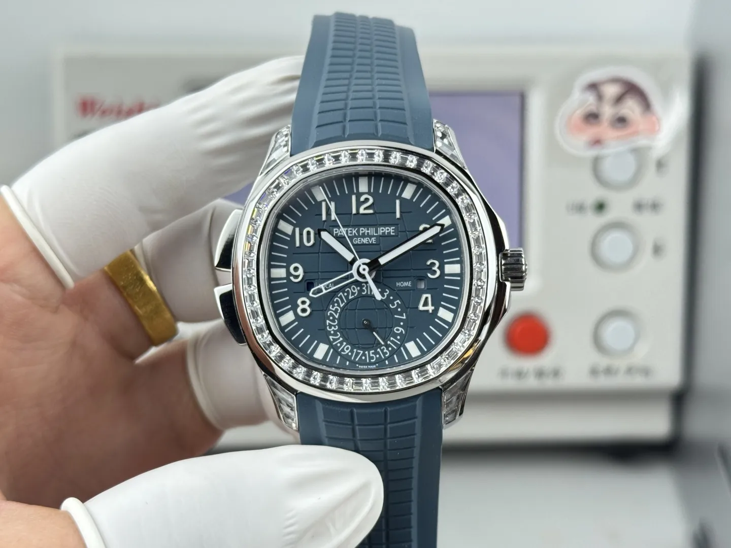 Luxury Patek Philippe Aquanaut 5164G Replica Blue-Gray Dial Diamond Bezel Blue Rubber Strap Travel Time Watch Front View