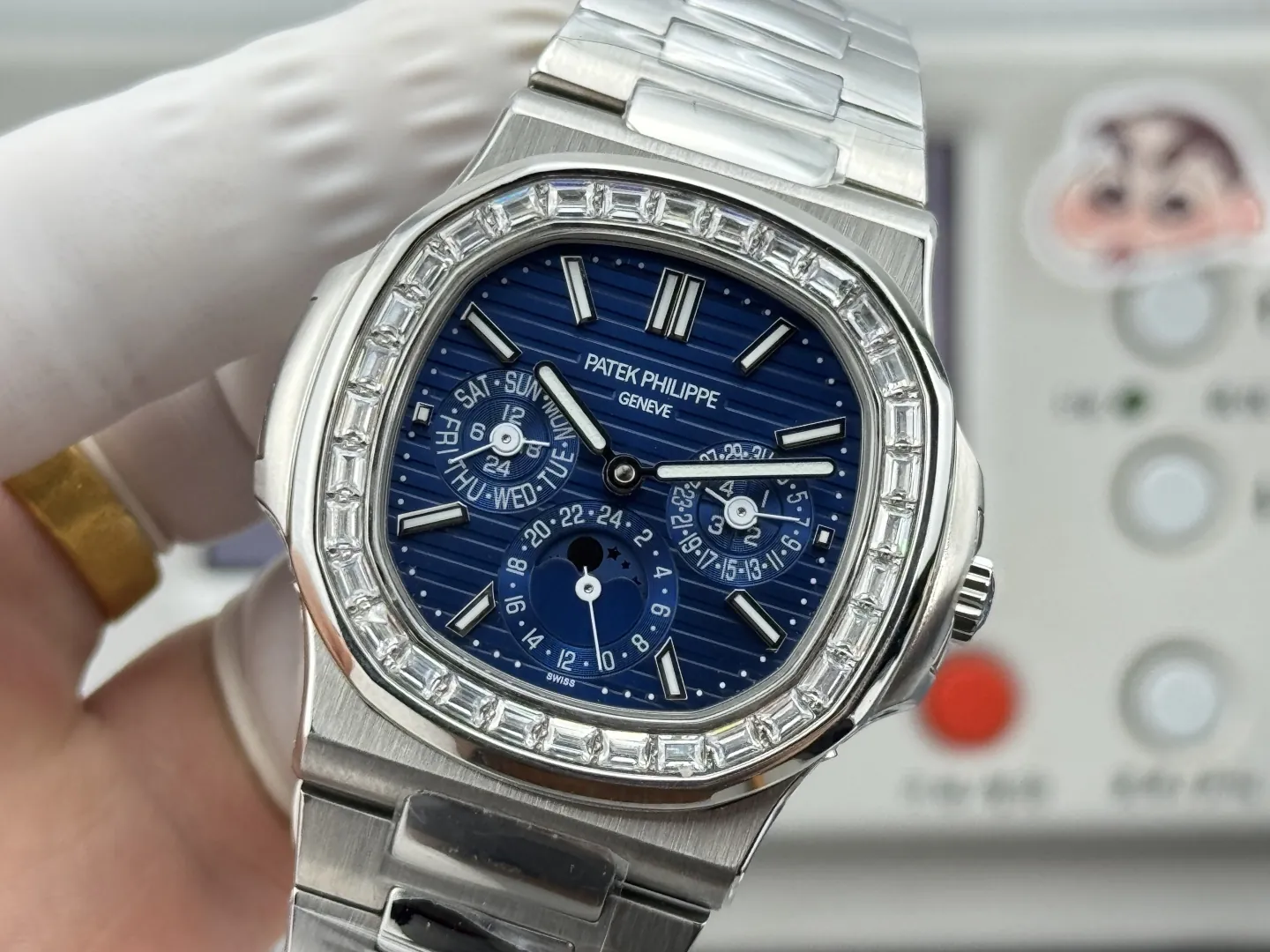 Luxury Patek Philippe Nautilus 5740/1G-001 Replica Blue Dial Baguette Diamond-set Bezel 40mm Super Clone Watch Dial Detail 1