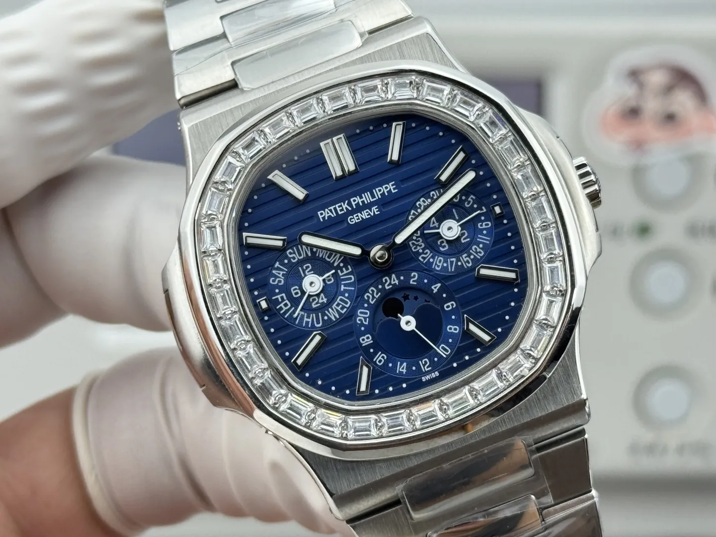 Luxury Patek Philippe Nautilus 5740/1G-001 Replica Blue Dial Baguette Diamond-set Bezel 40mm Super Clone Watch Dial Detail 2