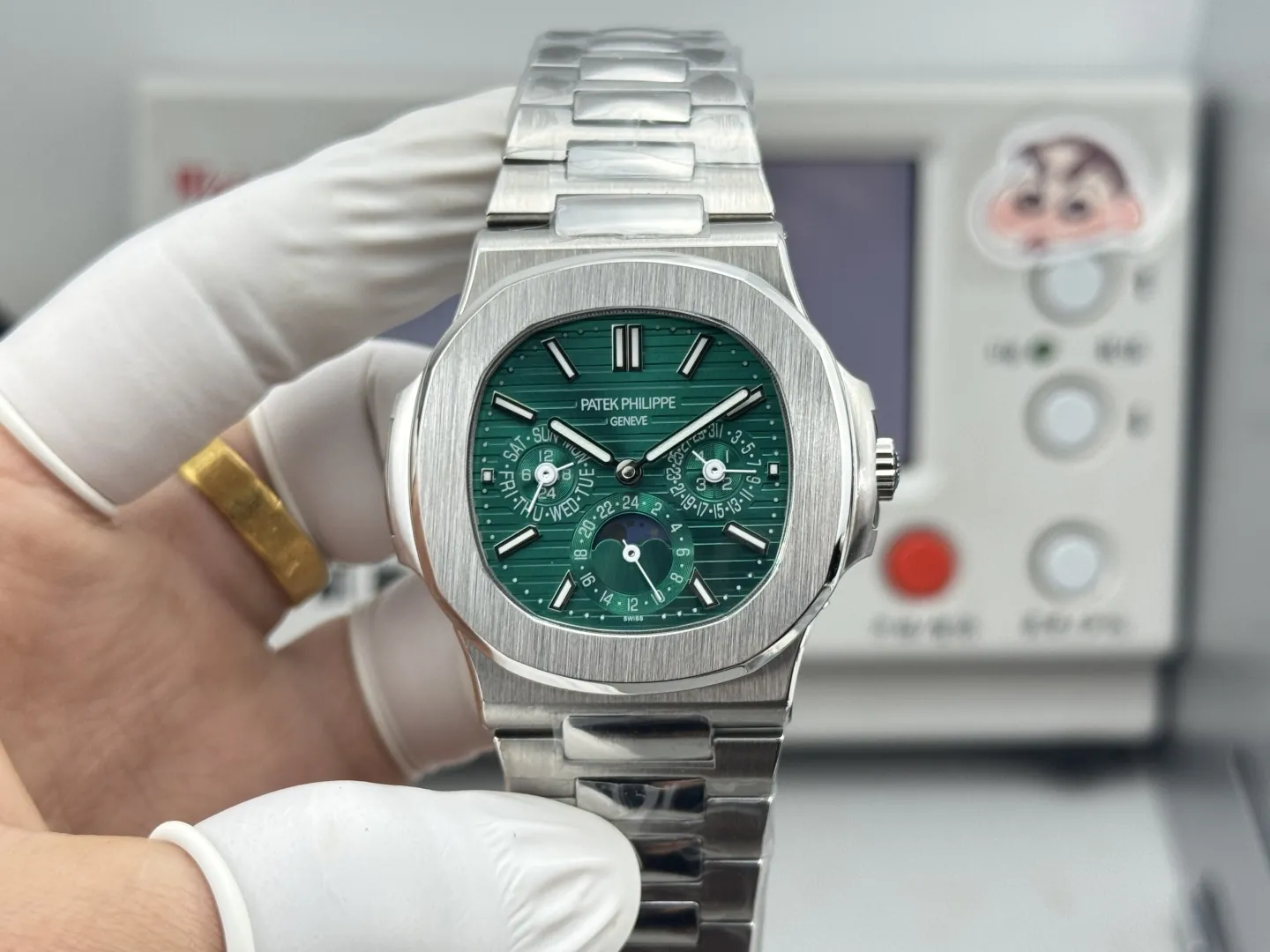 Patek Philippe Nautilus 5740/1G-001 Green Dial Perpetual Calendar 904L Stainless Steel Case 40mm Men's Watch Front View