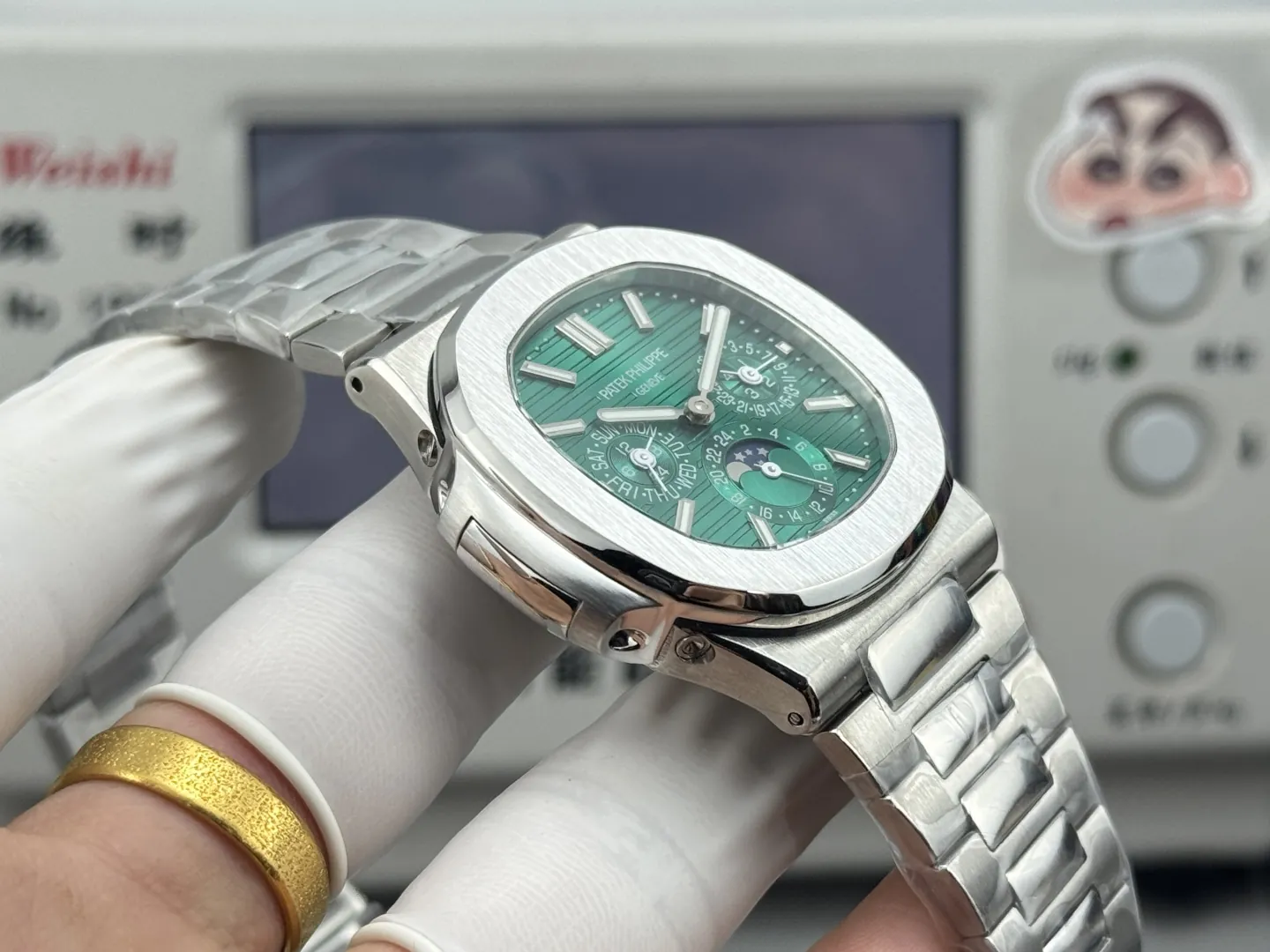 Patek Philippe Nautilus 5740/1G-001 Green Dial Perpetual Calendar 904L Stainless Steel Case 40mm Men's Watch Side View 1