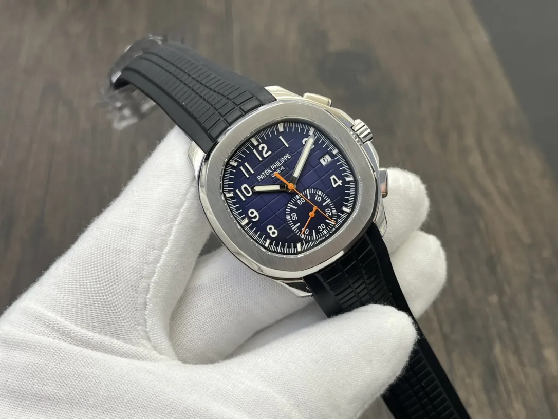 Luxury Patek Philippe Aquanaut 5968A Replica Blue Black Gradient Dial Orange Accents Black Rubber Strap 42.2mm Men's Watch Side View Of Dial 1