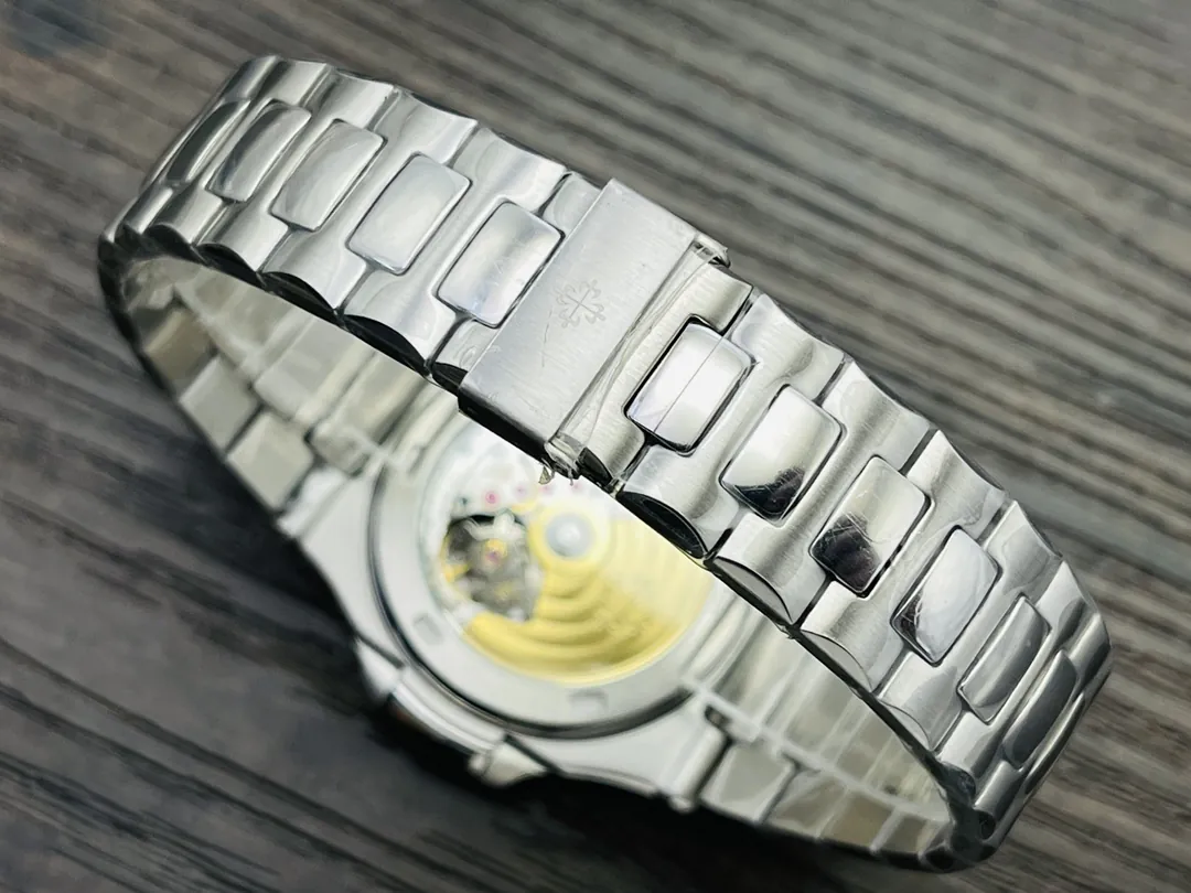 Luxury Patek Philippe Nautilus 5740/1G-001 Replica Tiffany Blue Dial Diamond-Set Bezel Moonphase Calendar Watch Bracelet