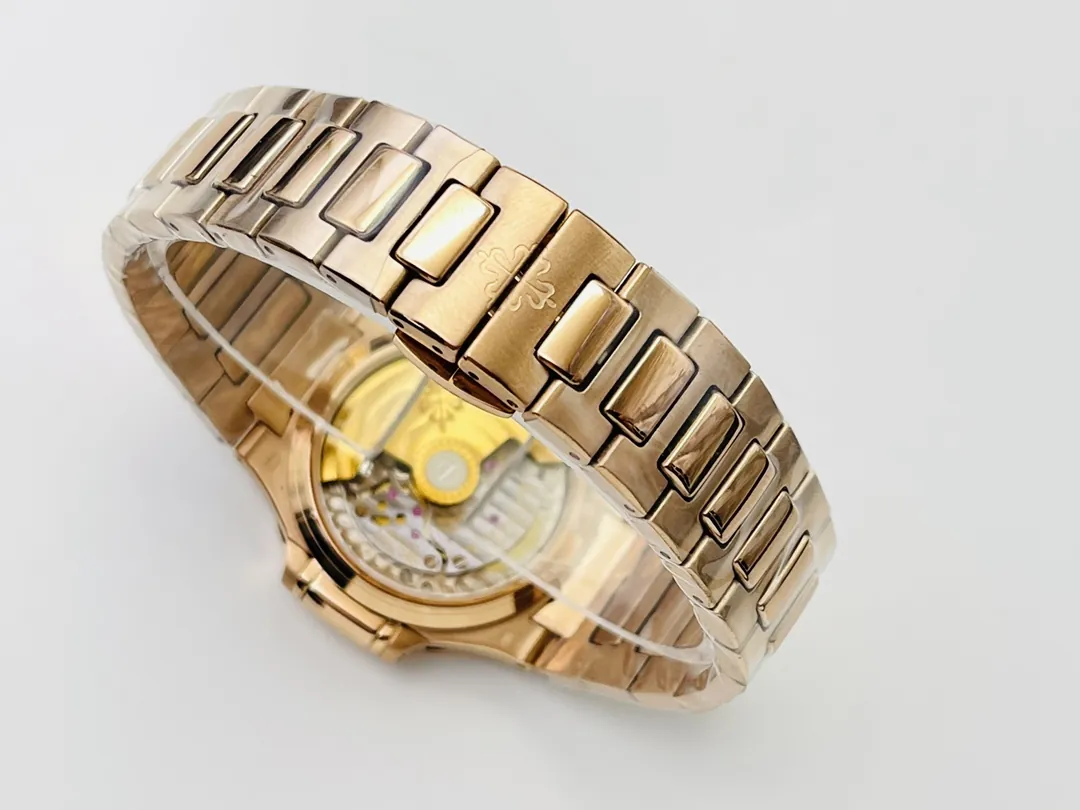Replica Patek Philippe Nautilus 7118/1R-001 Super Clone Silvery Opaline Wave Dial Rose Gold Tone Bracelet 35.2mm Ladies Watch Bracelet