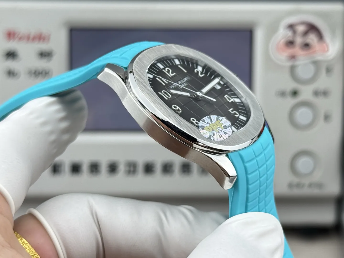 PPF Factory Patek Philippe Aquanaut 5167A Replica Sunburst Charcoal Gray Dial Tiffany Blue Rubber Strap Luxury Watch Side View 1
