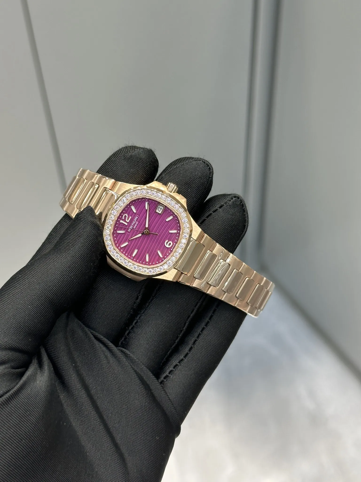 1:1 Super Clone Patek Philippe Nautilus 7010/1R-013 Replica Lacquered Purple Wave Dial Diamond Bezel 32mm Ladies Watch Side Profile Of The Dial