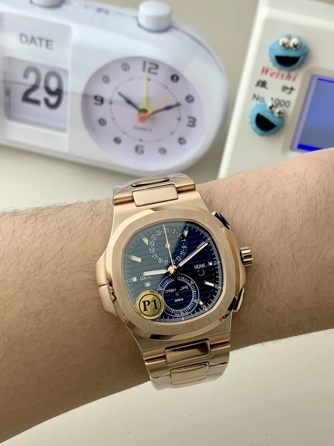 Patek Philippe Nautilus 5990/1R-001 Replica Horizontally Embossed Sunburst Blue Dial Rose Gold Tone Case Super Clone Watch Wrist Shot